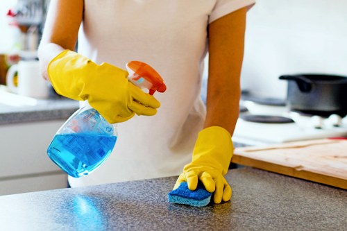Carpet cleaning team following safe working practices on site
